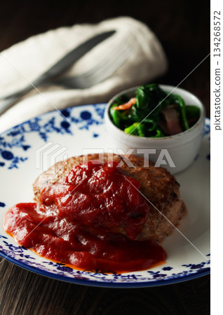 Hamburger steak, tomato sauce, butter-sauteed spinach and bacon 134268572