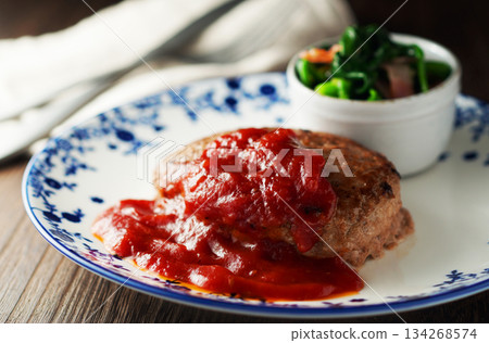 Hamburger steak, tomato sauce, butter-sauteed spinach and bacon 134268574