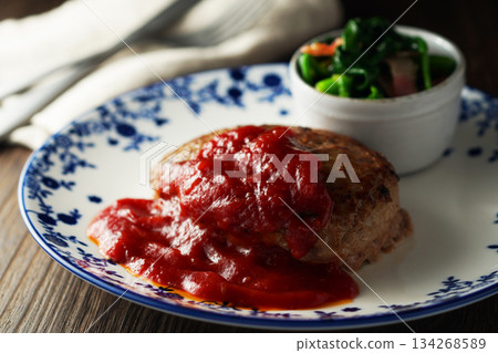 Hamburger steak, tomato sauce, butter-sauteed spinach and bacon 134268589