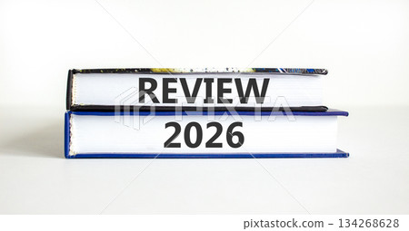 Review 2026 symbol. Concept words Review 2026 on beautiful books. Beautiful white paper background. Business and review 2026 concept. Copy space. Review 2026 symbol. Concept words Review 2026 on beautiful books. Beautiful white paper background. Business and review 2026 concept. Copy space. 134268628
