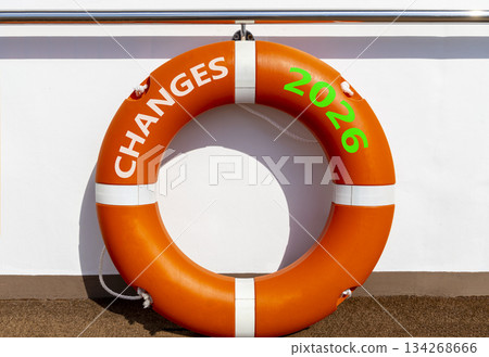 Changes 2026 symbol. Concept words Changes 2026 on beautiful orange lifebuoy. Beautiful white background. Beautiful orange lifebuoy. Business and changes 2026 concept. Copy space. 134268666