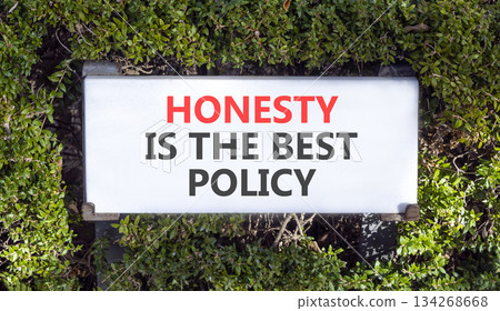 Honesty is the best policy symbol. Concept words Honesty is the best policy on white beautiful road sign. Beautiful green trees background. Business honesty is the best policy concept. Copy space. 134268668