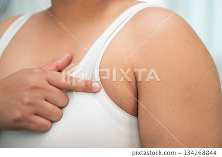 Asian big size overweight woman show armpit fat body. Asian big size overweight woman show armpit fat body. 134268844