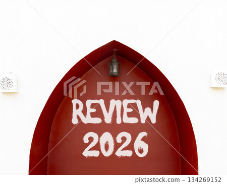 Review 2026 symbol. Concept words Review 2026 on beautiful white and red wall. Beautiful white and red wall background. Business and review 2026 concept. Copy space. Review 2026 symbol. Concept words Review 2026 on beautiful white and red wall. Beautiful white and red wall background. Business and review 2026 concept. Copy space. 134269152