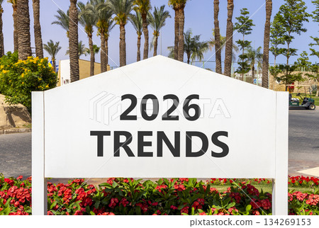 2026 Trends new year symbol. Concept words 2026 Trends on beautiful white road sign. Beautiful palm trees palm-trees and blue sky background. Business and 2026 Trends new year concept. Copy space. 2026 Trends new year symbol. Concept words 2026 Trends on beautiful white road sign. Beautiful palm trees palm-trees and blue sky background. Business and 2026 Trends new year concept. Copy space. 134269153