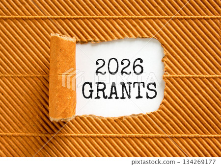 2026 Grants symbol. Concept words 2026 Grants on beautiful white paper. Beautiful brown paper background. Business and 2026 grants concept. Copy space. 2026 Grants symbol. Concept words 2026 Grants on beautiful white paper. Beautiful brown paper background. Business and 2026 grants concept. Copy space. 134269177