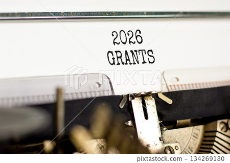 2026 Grants symbol. Concept words 2026 Grants typed on beautiful old retro typewriter. Beautiful white paper background. Beautiful old typewriter. Business and 2026 grants concept. Copy space. 134269180
