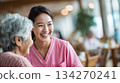 Caregivers at a care facility provide individualized care. 134270241
