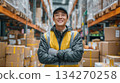 A male staff member inspects and checks incoming goods in the warehouse. A professional work scene carefully checking the data and actual items. 134270258