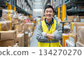 Male staff packing boxes on the shipping line. Professionals working in a clean and tidy workplace. 134270270
