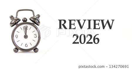 Review 2026 symbol. Concept words Review 2026 on beautiful white paper. Beautiful white paper background. Beautiful black alarm clock. Business and review 2026 concept. Copy space. Review 2026 symbol. Concept words Review 2026 on beautiful white paper. Beautiful white paper background. Beautiful black alarm clock. Business and review 2026 concept. Copy space. 134270691