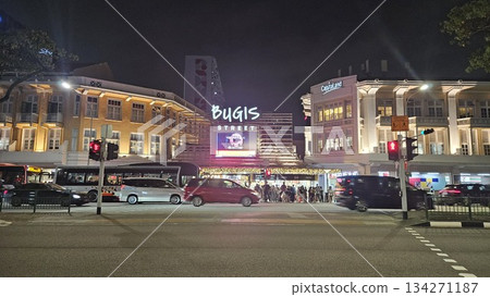 This is Bugis Street glows at night with neon signage, colonial facades, bustling traffic This is Bugis Street glows at night with neon signage, colonial facades, bustling traffic 134271187