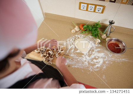 Chef Preparing Mushroom Filling For Pasta Dough On Clean Kitchen Counter Chef Preparing Mushroom Filling For Pasta Dough On Clean Kitchen Counter 134271451