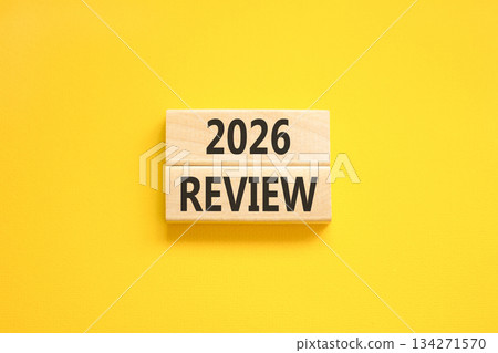 2026 Review symbol. Concept words 2026 Review on beautiful wooden blocks. Beautiful yellow paper background. Business and 2026 review concept. Copy space. 2026 Review symbol. Concept words 2026 Review on beautiful wooden blocks. Beautiful yellow paper background. Business and 2026 review concept. Copy space. 134271570