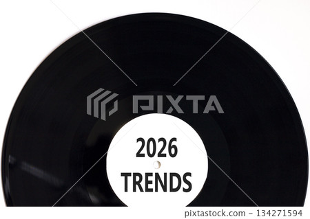 2026 Trends new year symbol. Concept words 2026 Trends on beautiful white and black vinyl disk. Beautiful white paper background. Business and 2026 Trends new year concept. Copy space. 134271594