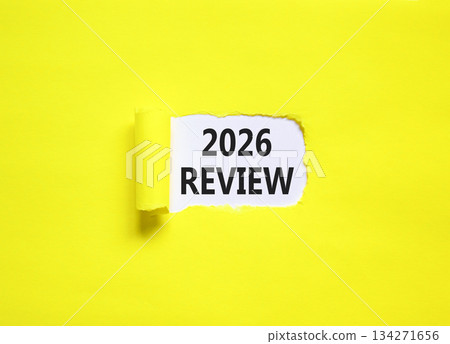 2026 Review symbol. Concept words 2026 Review on beautiful white paper. Beautiful yellow paper background. Business and 2026 review concept. Copy space. 134271656