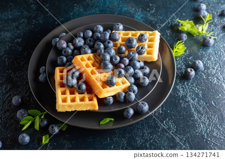 Belgian waffles with blueberries. Belgian waffles with blueberries. 134271741