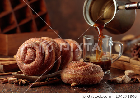 Swedish cinnamon rolls and black coffee. 134271806