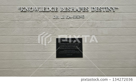 The Li Ka Shing building at NUS features arched windows and a bold quote on knowledge, reflecting academic excellence The Li Ka Shing building at NUS features arched windows and a bold quote on knowledge, reflecting academic excellence 134272036