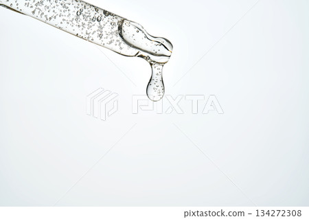 Cosmetic pipette dispensing serum bubble liquid drop 134272308