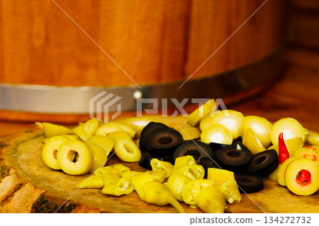 Olives and peppers for sale at market Olives and peppers for sale at market 134272732