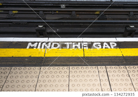 Mind The Gap Sign on London Underground Platform Edge 134272935