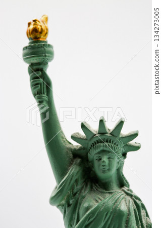 Statue of Liberty miniature figurine souvenir with green patina closeup. 134273005