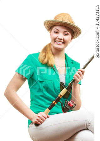 Woman with fishing rod , spinning equipment Woman with fishing rod , spinning equipment 134273115