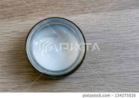 Open Jar of White Skincare Cream 134273816