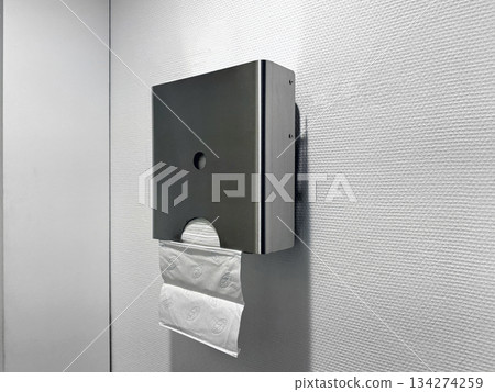 Hygienic paper towel dispenser for hand drying in bathroom. 134274259