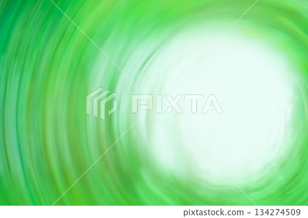Lights in circular green motion. Abstract green spinning radial light trail. 134274509