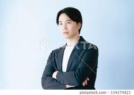 Businessman with arms folded 134274821