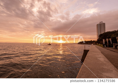 Minamichita Town, the statue of Jōroku Daishi at Seizaki and the sunrise over Chita Bay 134275586