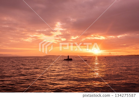 Minamichita Town, the statue of Jōroku Daishi at Seizaki and the sunrise over Chita Bay 134275587