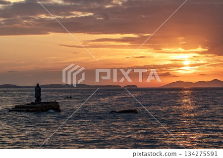 Minamichita Town, the statue of Jōroku Daishi at Seizaki and the sunrise over Chita Bay 134275591