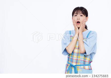 Surprised housewife Surprised housewife 134275883