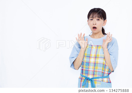 Surprised housewife 134275888