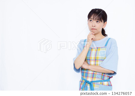 A housewife who is seriously worried 134276057