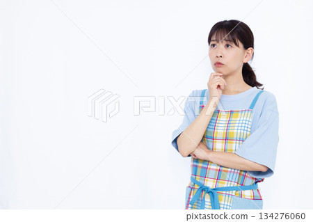 A housewife who is seriously worried 134276060