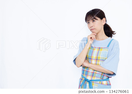 A housewife who is seriously worried A housewife who is seriously worried 134276061