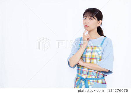 A housewife who is seriously worried A housewife who is seriously worried 134276076