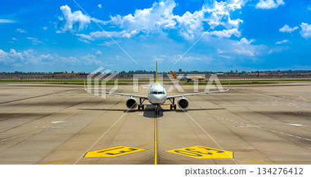 A view of Changi Airport with passenger planes waiting to depart on the runway 134276412