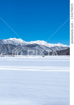 View of the Northern Alps from Omachi City (winter) 134276635