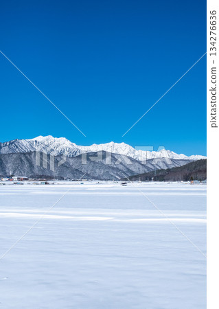 View of the Northern Alps from Omachi City (winter) 134276636