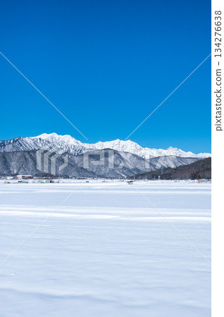 View of the Northern Alps from Omachi City (winter) 134276638