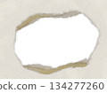 Torn cardboard with holes 134277260