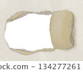 Torn cardboard with holes 134277261