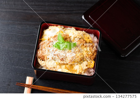 A hearty, freshly made pork cutlet rice bowl 134277575