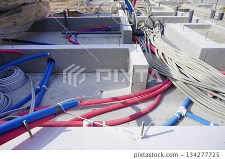 Foundation work for water supply pipes and drainage pipes in the foundations of apartment buildings 134277725