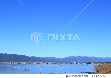 Snow-capped Mount Horai and practice at Lake Biwa Rowing Center Snow-capped Mount Horai and practice at Lake Biwa Rowing Center 134277880